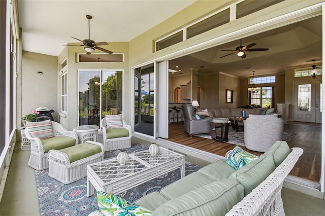 exterior space with a ceiling fan and an outdoor living space