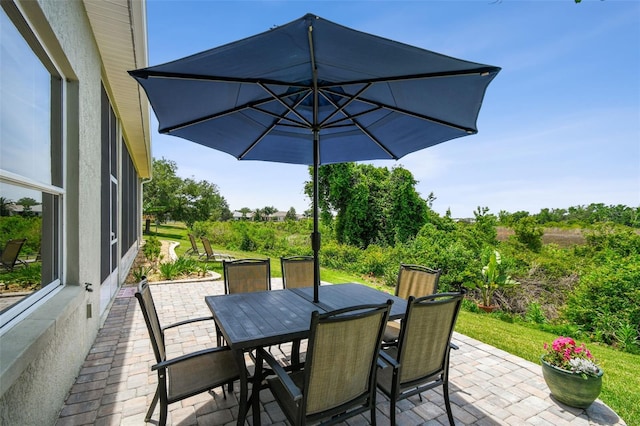 view of patio with outdoor dining area