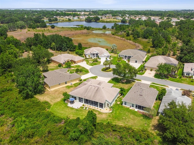 aerial view with a water view and a residential view