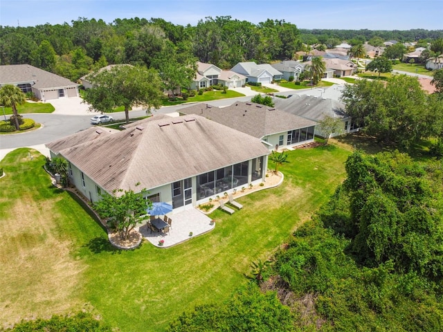 birds eye view of property with a residential view