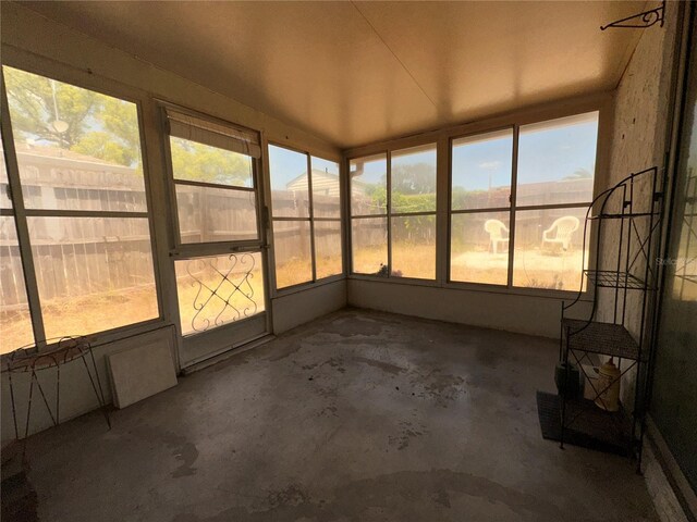 unfurnished sunroom with a healthy amount of sunlight