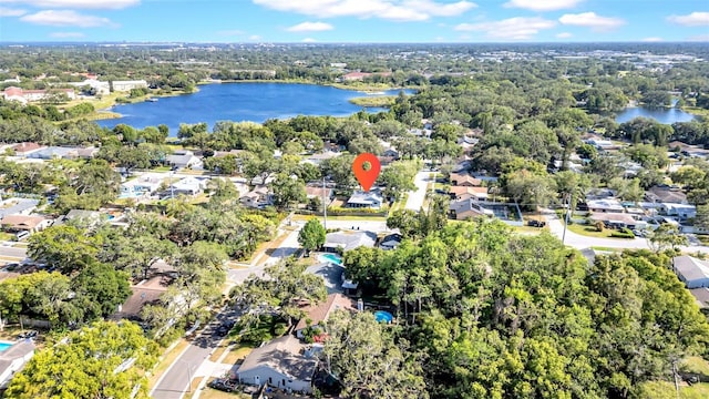 drone / aerial view featuring a water view and a residential view