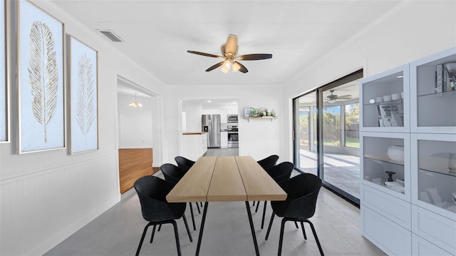 dining area with visible vents and ceiling fan