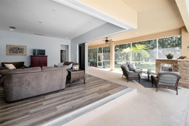 1033 Tuscany Dr, Trinity, FL 34655 - living room featuring ceiling fan and visible vents