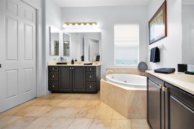 1033 Tuscany Dr, Trinity, FL 34655 - full bath featuring a sink, tile patterned flooring, a bath, and two vanities