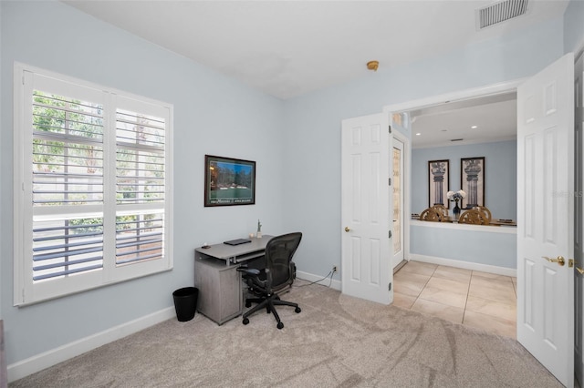 1033 Tuscany Dr, Trinity, FL 34655 - tiled office space featuring visible vents, baseboards, and carpet floors