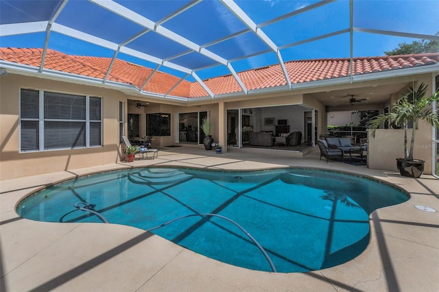 1033 Tuscany Dr, Trinity, FL 34655 - pool featuring glass enclosure, a patio, an outdoor living space, and a ceiling fan