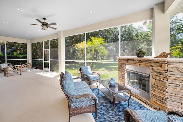 1033 Tuscany Dr, Trinity, FL 34655 - view of patio with ceiling fan and an outdoor living space with a fireplace