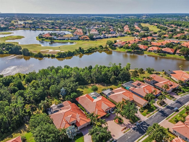 1033 Tuscany Dr, Trinity, FL 34655 - aerial view with a residential view, view of golf course, and a water view