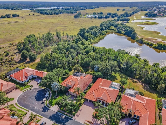1033 Tuscany Dr, Trinity, FL 34655 - bird's eye view featuring a residential view, a water view, and golf course view