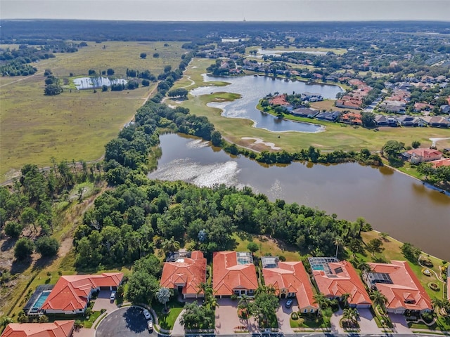 1033 Tuscany Dr, Trinity, FL 34655 - drone / aerial view with a residential view, a water view, and golf course view