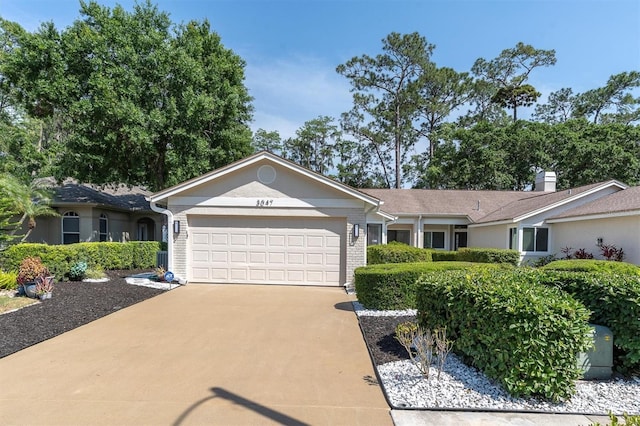 3047 Bolt Dr, Palm Harbor, FL 34685 - single story home featuring brick siding, driveway, and a garage