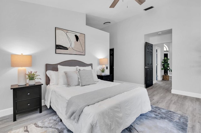 3047 Bolt Dr, Palm Harbor, FL 34685 - bedroom with wood finished floors, visible vents, baseboards, and ceiling fan