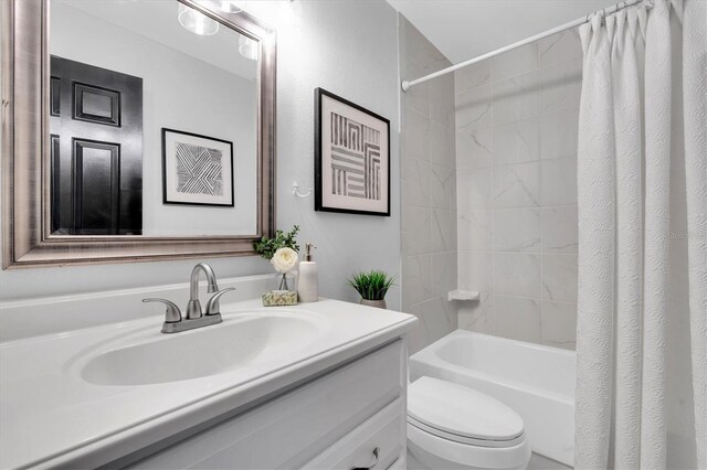 3047 Bolt Dr, Palm Harbor, FL 34685 - bathroom featuring shower / bath combo with shower curtain, toilet, and vanity