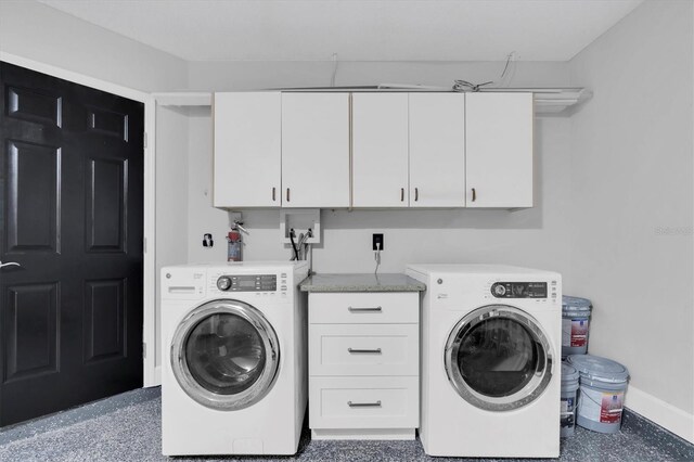 3047 Bolt Dr, Palm Harbor, FL 34685 - clothes washing area featuring cabinet space, independent washer and dryer, and baseboards