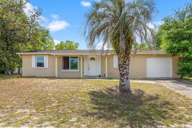 9640 Northcliffe Blvd, Spring Hill, FL 34608 - ranch-style home featuring driveway and an attached garage
