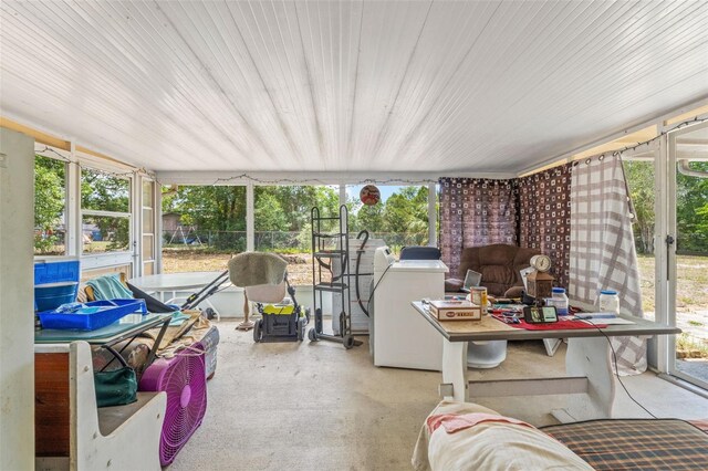 9640 Northcliffe Blvd, Spring Hill, FL 34608 - sunroom featuring washer / clothes dryer and plenty of natural light