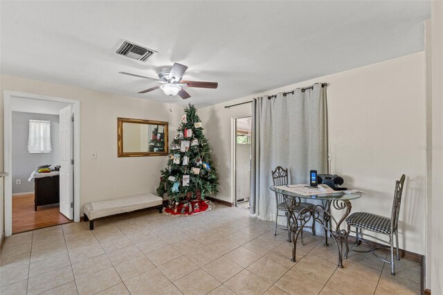 9640 Northcliffe Blvd, Spring Hill, FL 34608 - dining space with visible vents, ceiling fan, and light tile patterned flooring