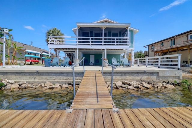6622 Seaview Blvd, Hudson, FL 34667 - dock with stairway, a water view, and a patio