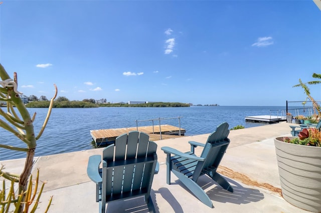 6622 Seaview Blvd, Hudson, FL 34667 - view of patio / terrace with a water view and a floating dock