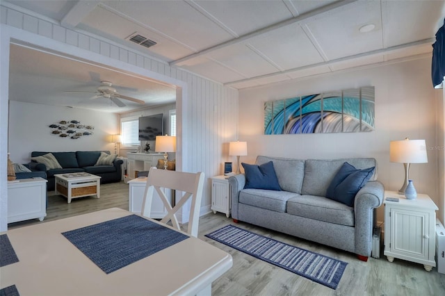 6622 Seaview Blvd, Hudson, FL 34667 - living area featuring light wood-type flooring and ceiling fan