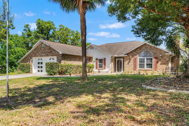 13469 Pia Ct, Spring Hill, FL 34609 - single story home with brick siding, a front lawn, an attached garage, and concrete driveway