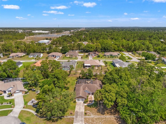 13469 Pia Ct, Spring Hill, FL 34609 - birds eye view of property with a view of trees and a residential view