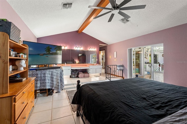 13469 Pia Ct, Spring Hill, FL 34609 - bedroom with light tile patterned flooring, a textured ceiling, and visible vents