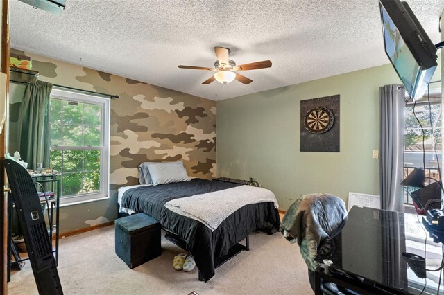 13469 Pia Ct, Spring Hill, FL 34609 - bedroom featuring baseboards, carpet flooring, wallpapered walls, and a textured ceiling