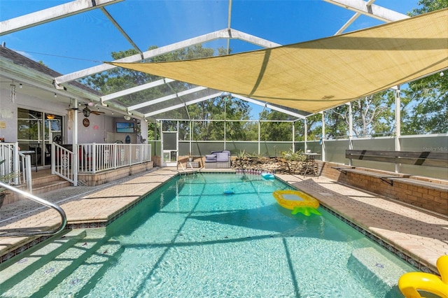13469 Pia Ct, Spring Hill, FL 34609 - view of pool featuring glass enclosure, a patio, and a fenced in pool