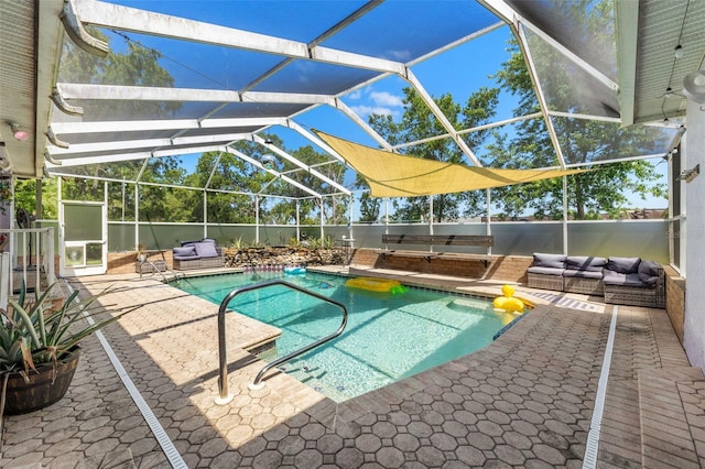13469 Pia Ct, Spring Hill, FL 34609 - view of swimming pool with a fenced in pool, glass enclosure, an outdoor hangout area, and a patio area