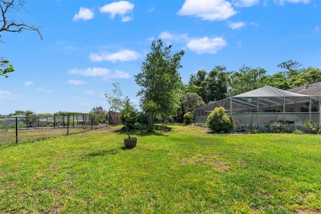 13469 Pia Ct, Spring Hill, FL 34609 - view of yard featuring glass enclosure and fence