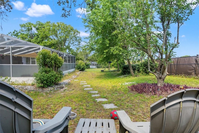 13469 Pia Ct, Spring Hill, FL 34609 - view of yard featuring fence and glass enclosure