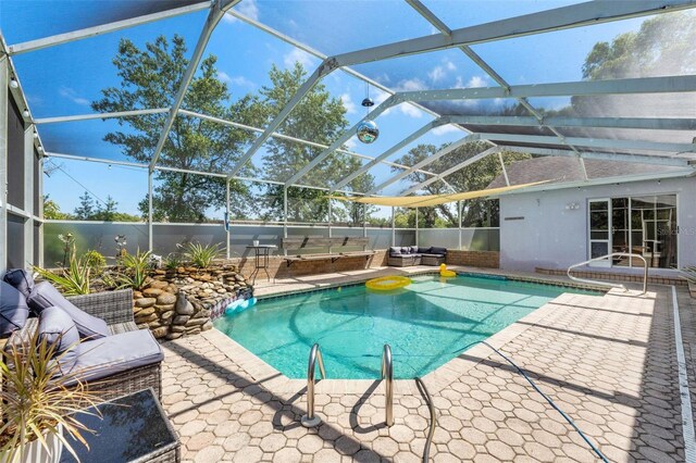 13469 Pia Ct, Spring Hill, FL 34609 - view of swimming pool featuring a patio, area for grilling, and glass enclosure