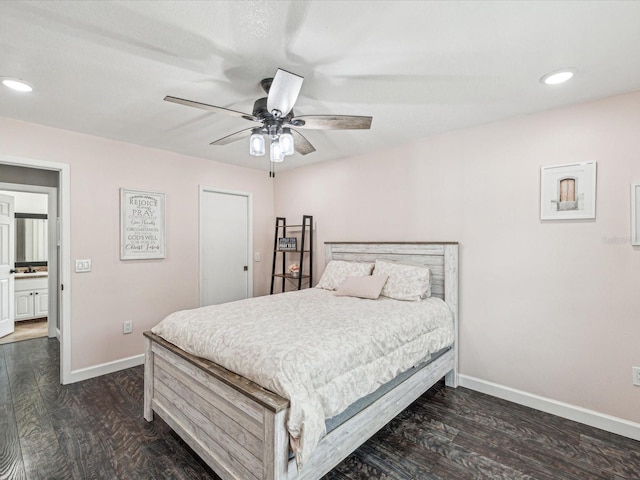 bedroom with recessed lighting, dark wood-style flooring, and baseboards