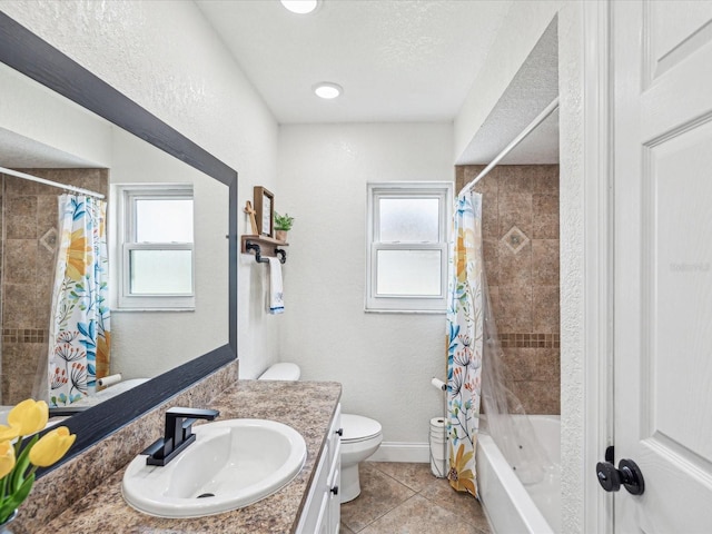 full bath featuring shower / tub combo, a healthy amount of sunlight, toilet, and tile patterned flooring