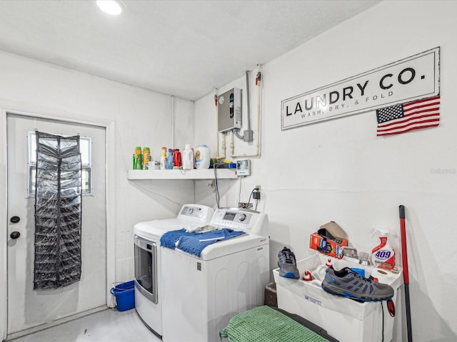 laundry room featuring washer and dryer and laundry area
