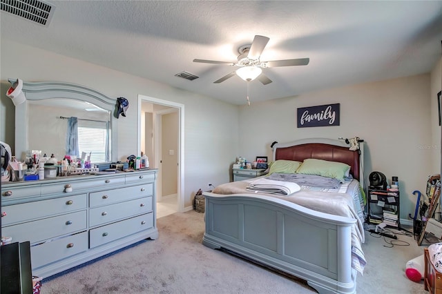 680 Argyll Dr, Spring Hill, FL 34609 - bedroom with ceiling fan, baseboards, visible vents, and light colored carpet