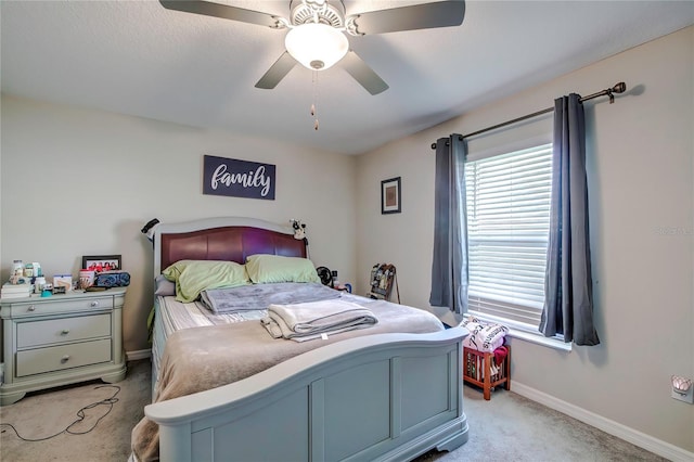 680 Argyll Dr, Spring Hill, FL 34609 - bedroom with light carpet, a ceiling fan, and baseboards