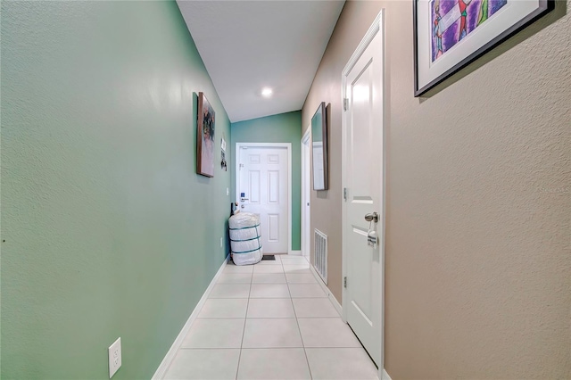 680 Argyll Dr, Spring Hill, FL 34609 - hall featuring baseboards, visible vents, and light tile patterned floors