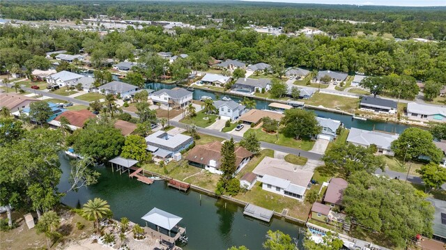 bird's eye view with a water view and a residential view