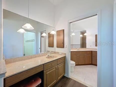 9237 Penelope Dr, Weeki Wachee, FL 34613 - bathroom with toilet and vanity
