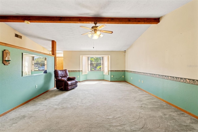 3029 Harrow Rd, Spring Hill, FL 34606 - unfurnished room featuring carpet flooring, baseboards, visible vents, and vaulted ceiling with beams