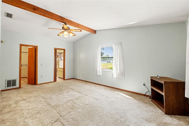 3029 Harrow Rd, Spring Hill, FL 34606 - unfurnished bedroom with baseboards, visible vents, lofted ceiling with beams, and carpet