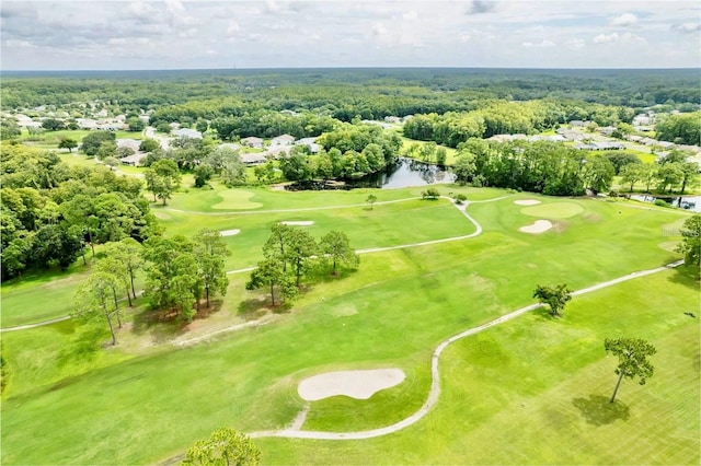 aerial view featuring golf course view and a water view