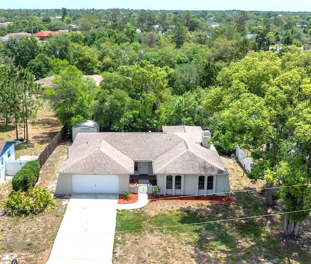 aerial view featuring a forest view