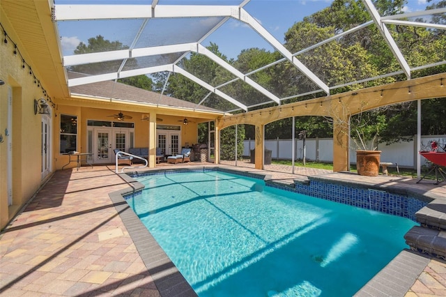 18502 Winding Oaks Blvd, Hudson, FL 34667 - view of pool featuring ceiling fan, french doors, a patio area, fence, and a fenced in pool