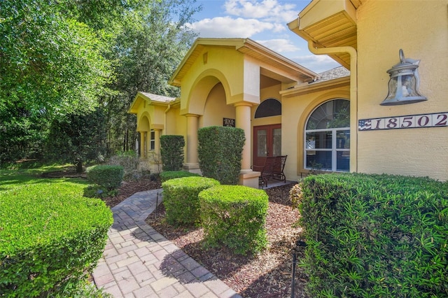18502 Winding Oaks Blvd, Hudson, FL 34667 - entrance to property featuring stucco siding