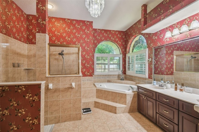 18502 Winding Oaks Blvd, Hudson, FL 34667 - full bathroom with tile patterned flooring, walk in shower, wallpapered walls, and a bath