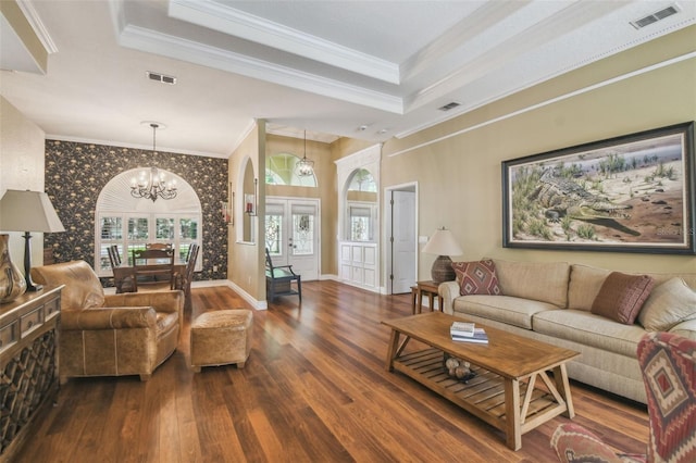 18502 Winding Oaks Blvd, Hudson, FL 34667 - living room with a wealth of natural light, wood finished floors, and visible vents